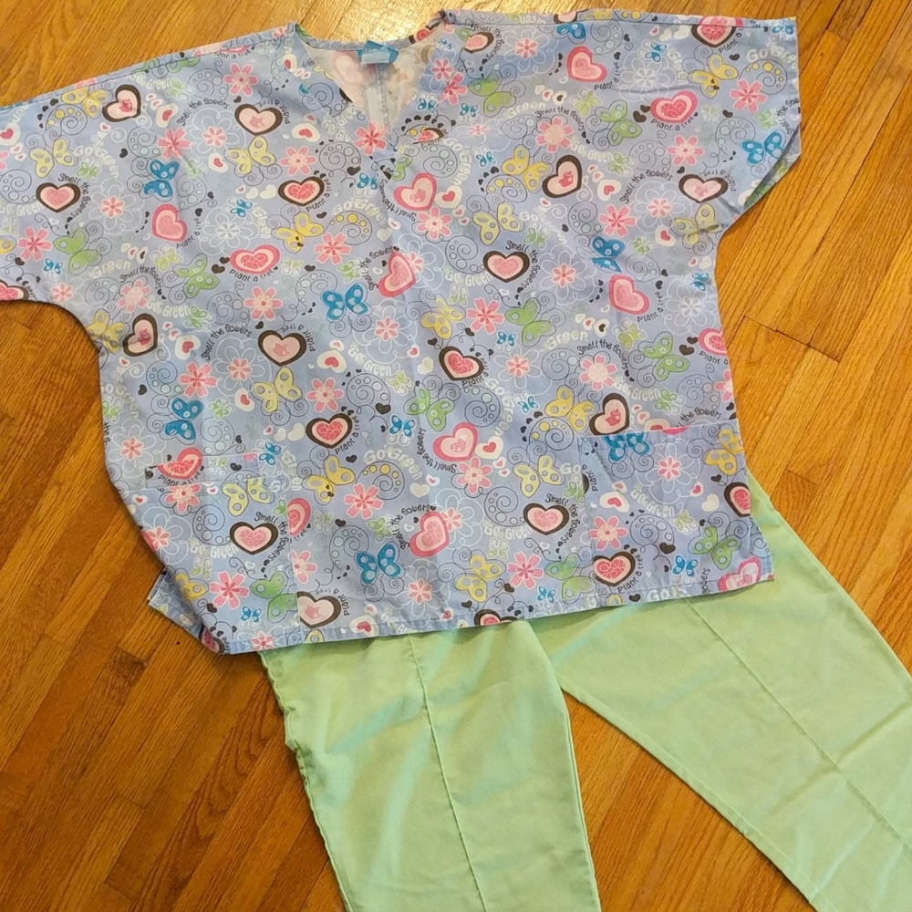 H.Q. retro uniform top. Light green pants.